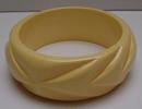 Bakelite Wide Taffy Colored Carved Bangle