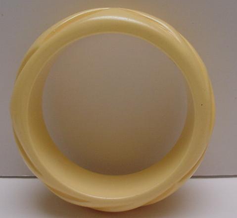 Bakelite Wide Taffy Colored Carved Bangle