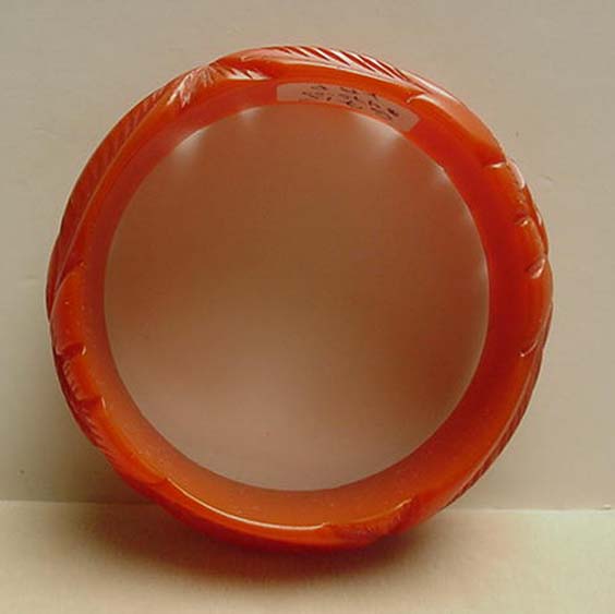 Bakelite Deeply Carved Coral Bangle Bracelet