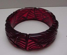 Bakelite Carved Red Translucent Bangle