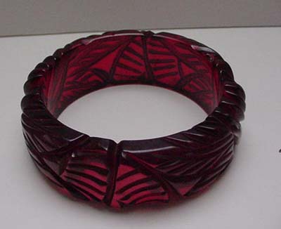 Bakelite Carved Red Translucent Bangle
