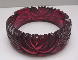 Bakelite Carved Red Translucent Bangle