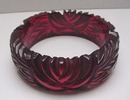 Bakelite Carved Red Translucent Bangle
