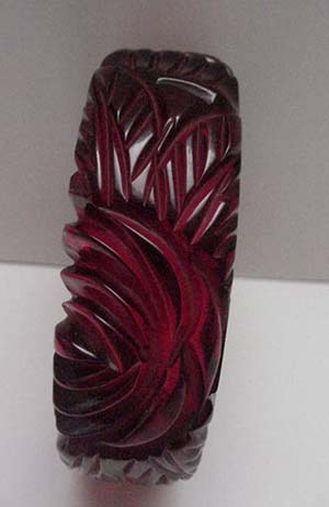 Bakelite Carved Red Translucent Bangle