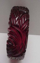 Bakelite Carved Red Translucent Bangle
