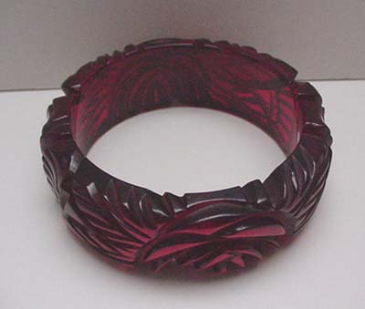 Bakelite Carved Red Translucent Bangle