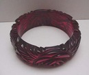 Bakelite Carved Red Translucent Bangle