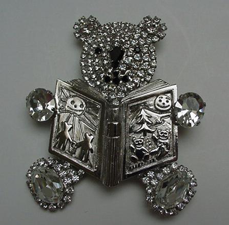 Costume jewelry-Butler and Wilson Reading Bear