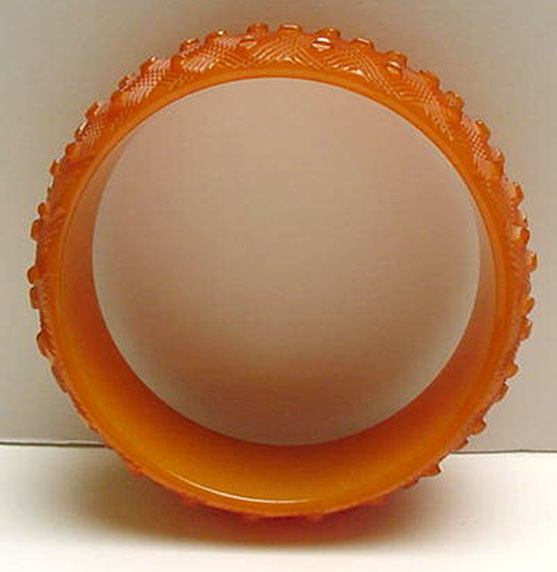 Bakelite Pumpkin Colored Vintage Bangle with goose bumps