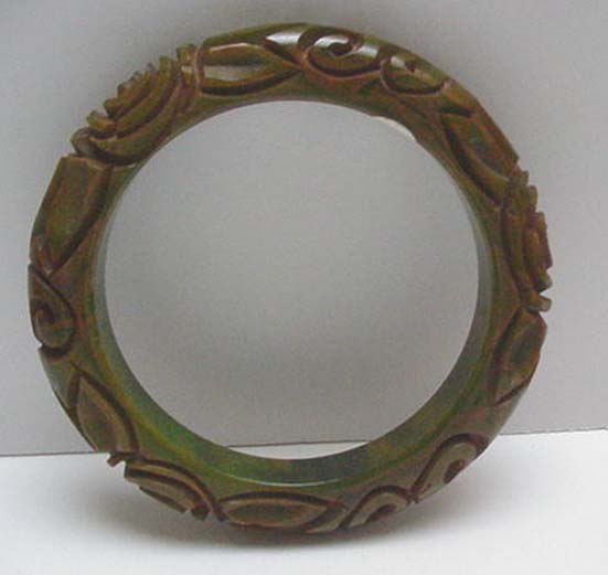 Bakelite Marbelized Green Deeply carved flowers