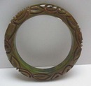 Bakelite Marbelized Green Deeply carved flowers