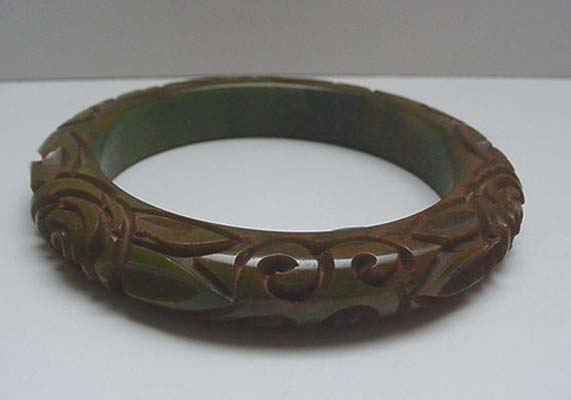 Bakelite Marbelized Green Deeply carved flowers