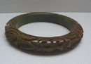 Bakelite Marbelized Green Deeply carved flowers
