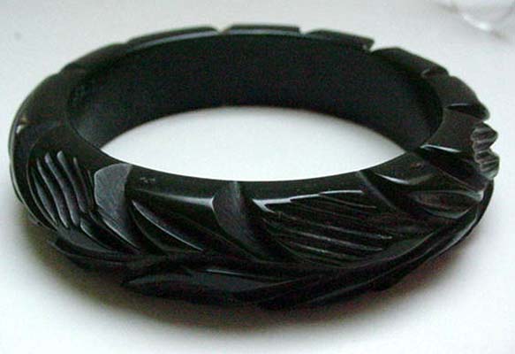 Bakelite Dark Green Deeply Carved Leaves