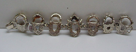 Costume jewelry Bracelet with Asian faces