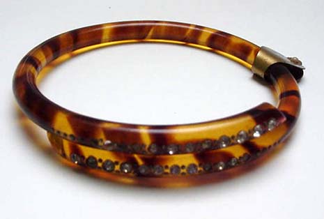 Celluloid tortoiseshell colored bangle with rhinestones