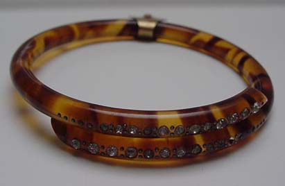 Celluloid tortoiseshell colored bangle with rhinestones