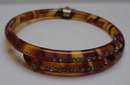 Celluloid tortoiseshell colored bangle with rhinestones