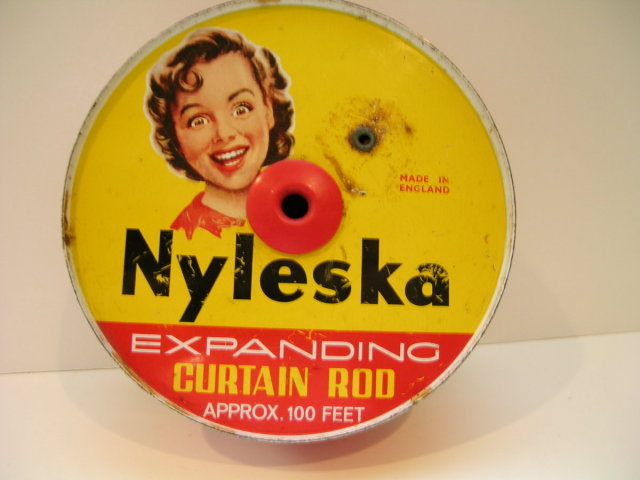 Nyleska Expanding Curtain Rod Advertising Tin