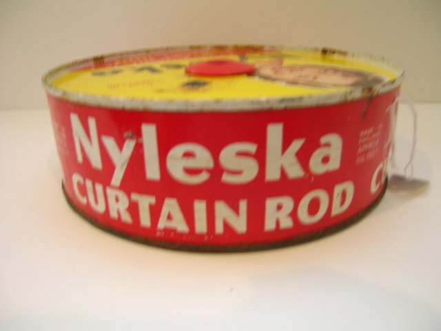 Nyleska Expanding Curtain Rod Advertising Tin