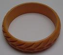 Bakelite butterscotch carved bangle