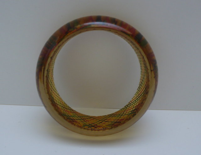 Bakelite Vintage Applejuice reverse Carved