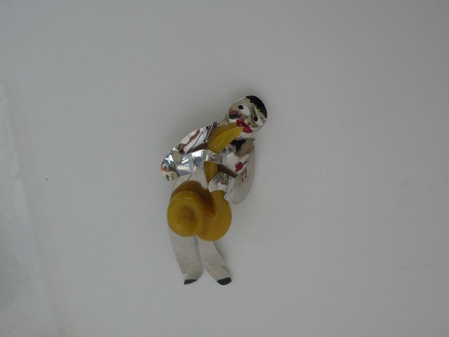 Butler & Wilson Deco Saxophone Player