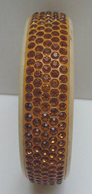 Celluloid Bangle with gold rhinestones