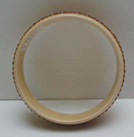 Celluloid Bangle with gold rhinestones