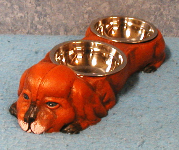 Dog with a set of (2) dishes