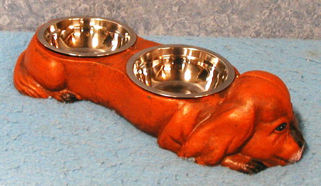 Dog with a set of (2) dishes