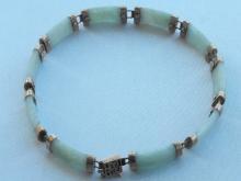 10 K YELLOW GOLD JADE TENNIS BRACELET