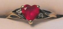 10k solid yellow gold ladies Heart cut Ruby and Diamond ring