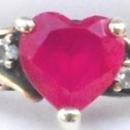 10k solid yellow gold ladies Heart cut Ruby and Diamond ring