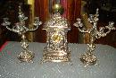 Nineteenth Century French Theree Piece Clock Set Silver Over Bronze, Pierced In The Moorish Orientalist Style, With Matching Candelabra