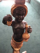 Late Eighteenth Century Assembled Pair of Ebonized, Carved and Gilded Blackamoors