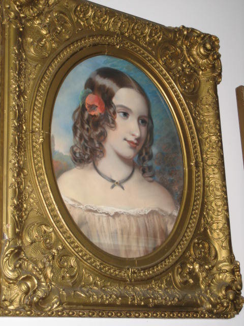 Mid-Nineteenth Century American Pastel on Paper Laid Down on Board of a Beautiful Young Lady with a Flower in Her Hair