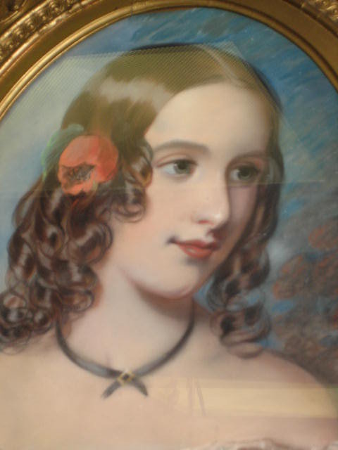 Mid-Nineteenth Century American Pastel on Paper Laid Down on Board of a Beautiful Young Lady with a Flower in Her Hair