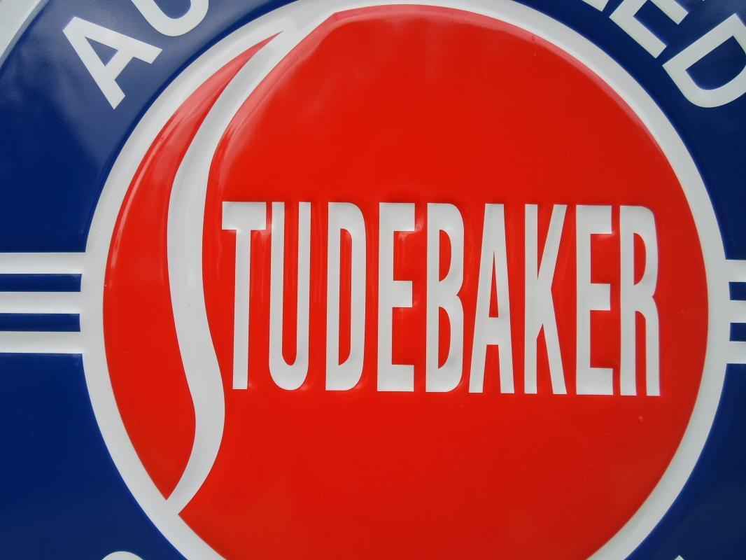 OUR LARGEST AUTHORIZED STUDEBAKER SERVICE GARAGE METAL SIGN // MADE IN USA