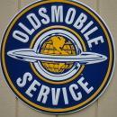 LOT OF THREE OF OUR LARGEST GENERAL MOTORS OK USED CARS SIGNS - BUICK - OLDSMOBILE - CADILLAC SIGNS - FREE SHIPPING