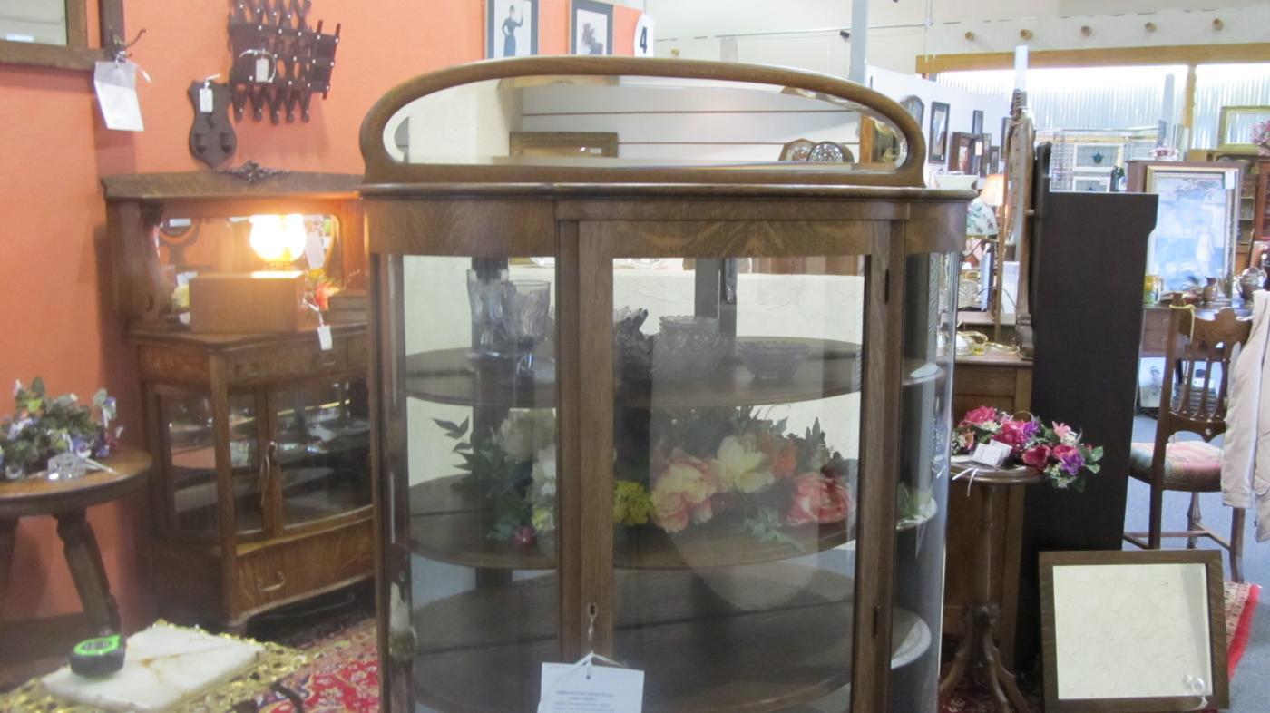 American Oak Curved Glass China/Curio Cabinet (half moon shaped mirror crown)