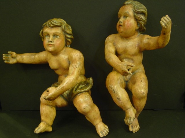 Pair of French wood polychromed Putti