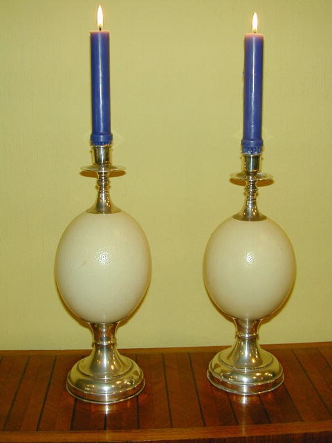 Pair of Ostrich Eggs and silverered metal Candlesticks