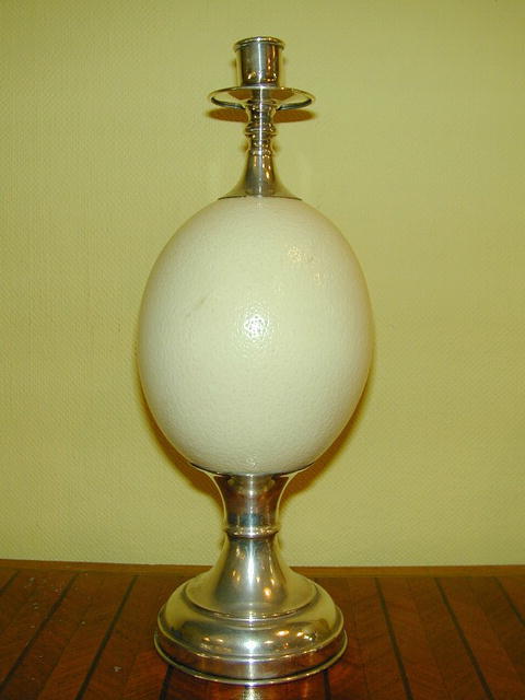 Pair of Ostrich Eggs and silverered metal Candlesticks