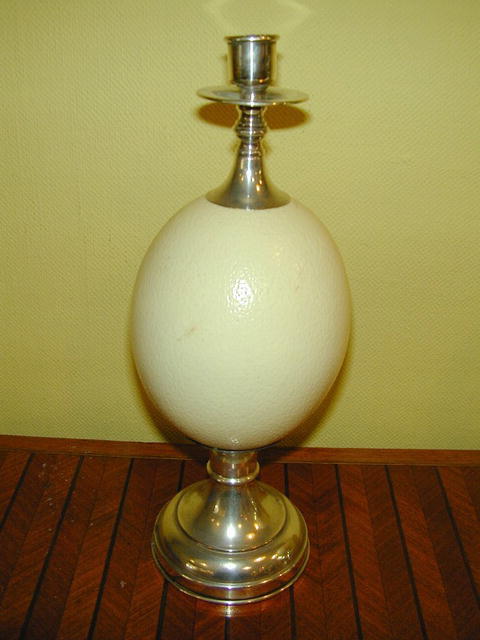 Pair of Ostrich Eggs and silverered metal Candlesticks