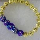 Shamballa beaded bracelet with gold tone beads