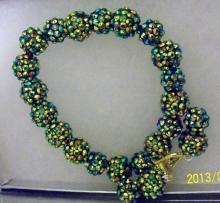 Shamballa beaded dark green aurora borealis earrings and bracelets