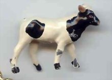 SALE Signed Metal Cow