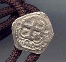 SALE Bolo with a coin on it.