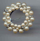 SALE Simulated Pearls in a Circle Pin.